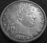 Silver Barber Half Dollar.